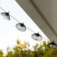 Guirlande lumineuse solaire 10 abat-jours en résille métallique LED blanc chaud CAPELU 3.80m